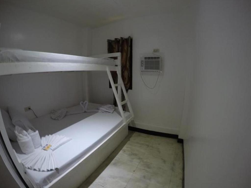 אל נידו Alexzus Backpackers Travel Lodge מראה חיצוני תמונה
